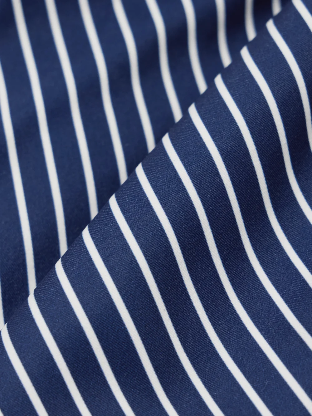 Close-up detail of the Andres Otalora Alborada Strapless Striped Stretch Cotton-twill Peplum Top