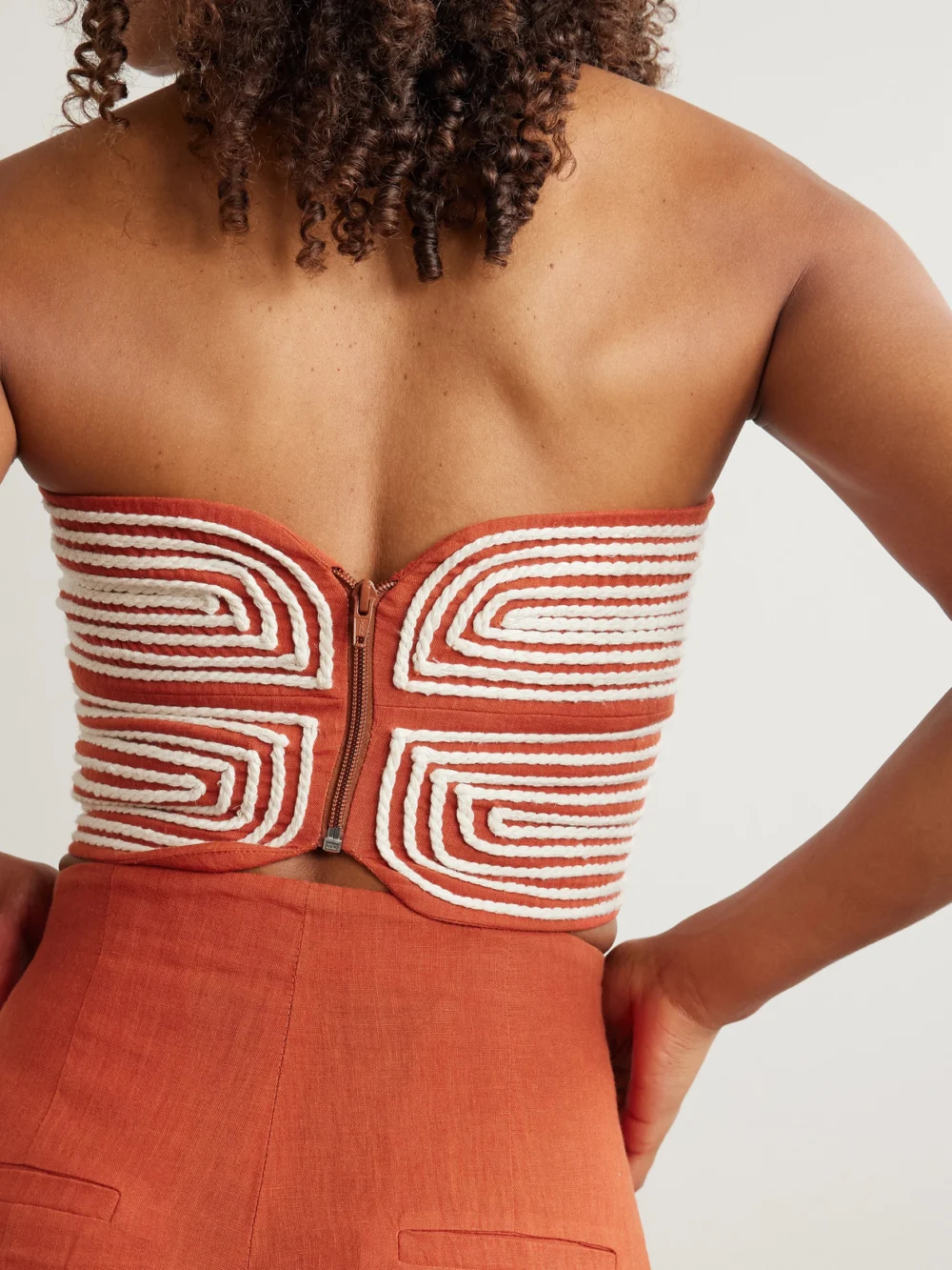 Back view of the Andres Otalora Baia Cutout Embroidered Linen Bustier Top