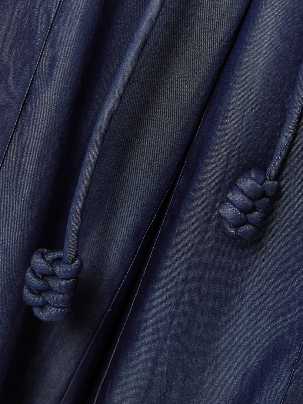 Close-up detail of the Andres Otalora Belted Tencel Wide-leg Pants