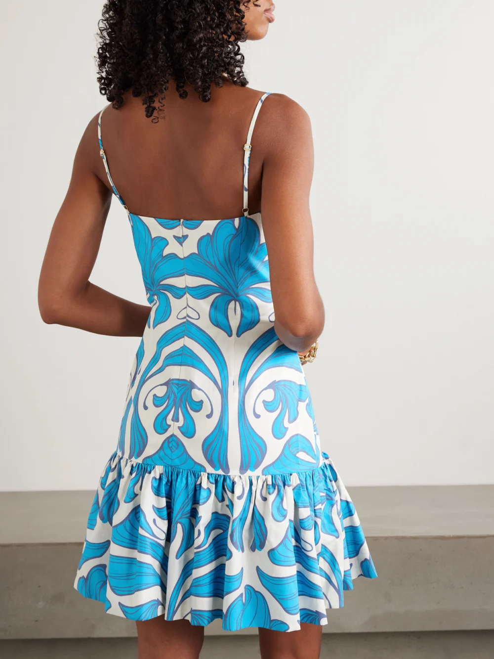 Back view of the Andres Otalora Joyita Tiered Printed Linen Mini Dress