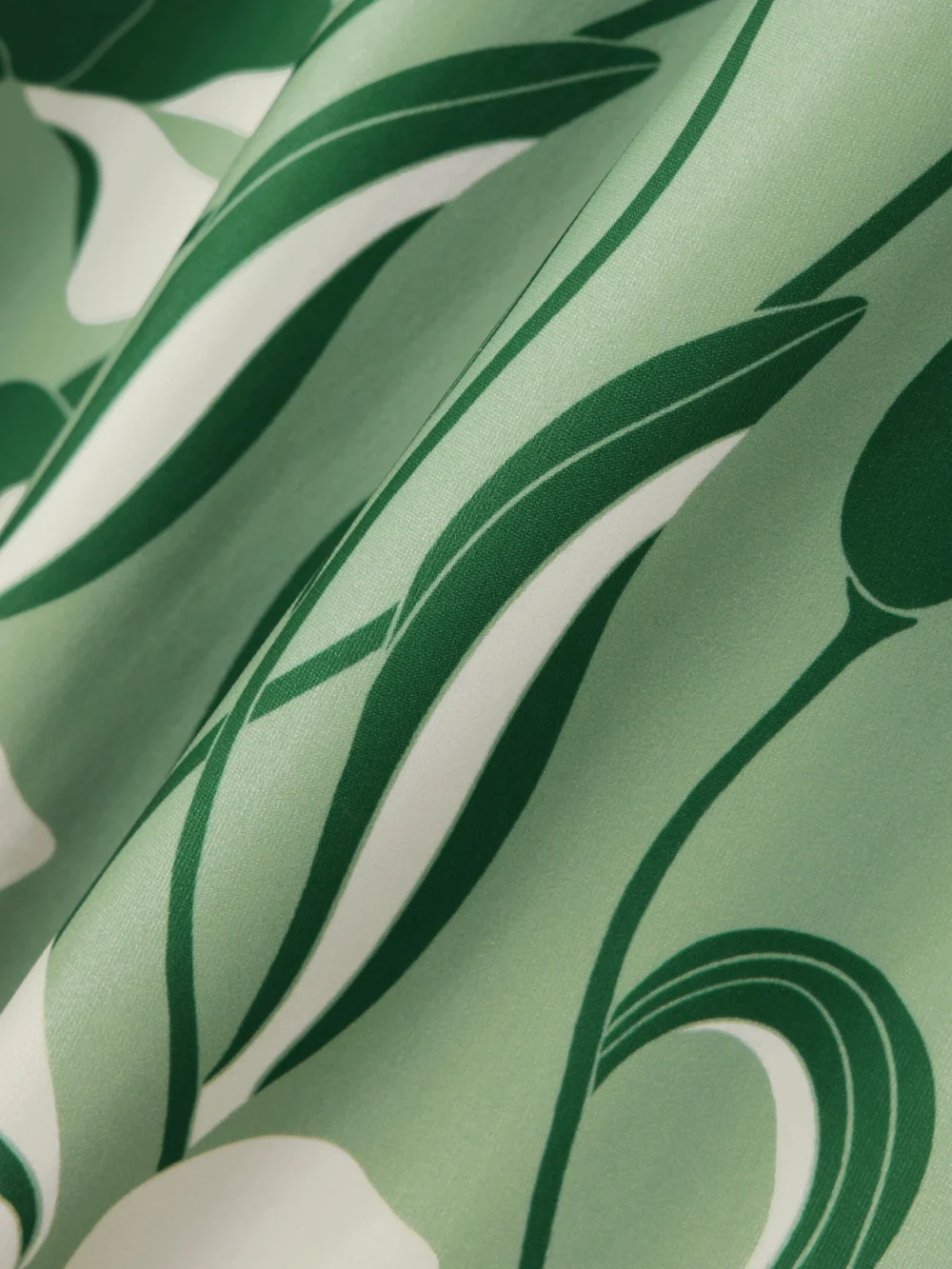 Close-up detail of the Andres Otalora Luz De Si Floral-print Stretch-scuba Wide-leg Pants