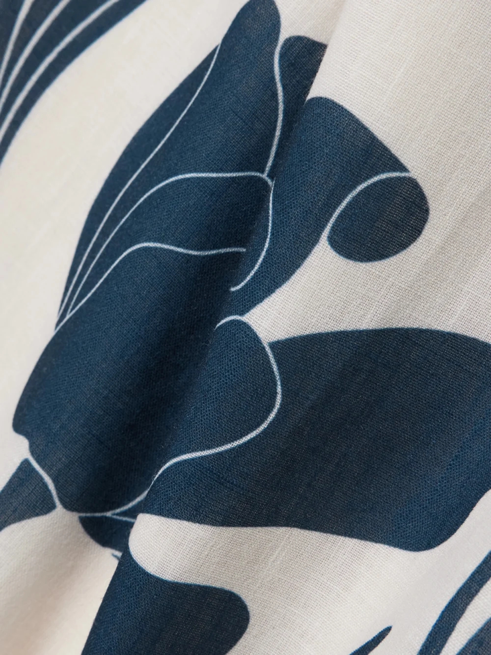 Close-up detail of the Andres Otalora Pasos De Jardin Floral-print Linen Midi Dress