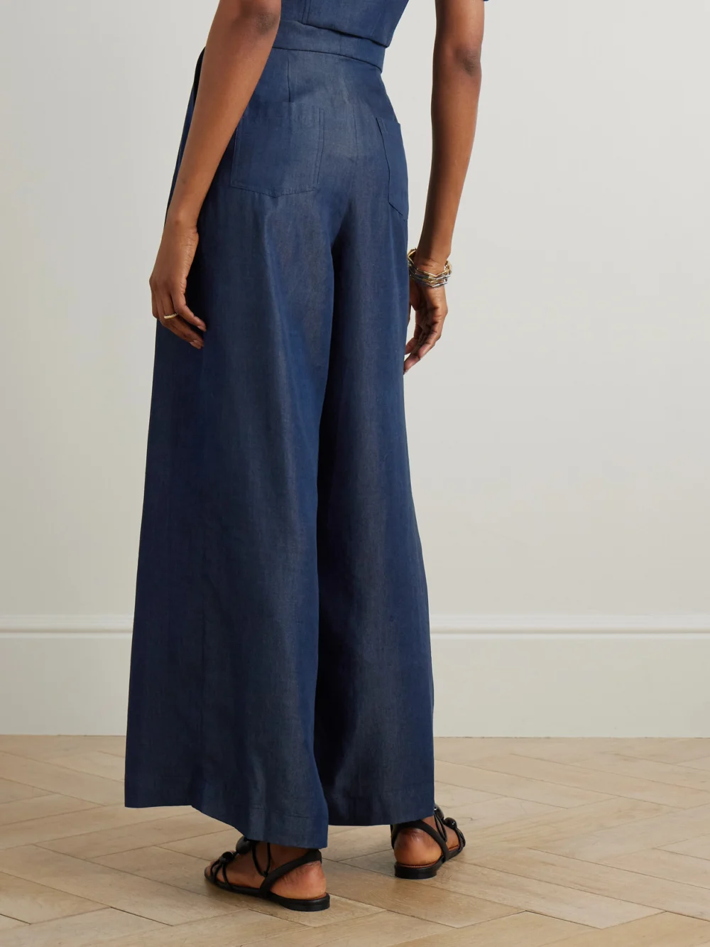 Back view of the Andres Otalora Plenitud Pleated Tencel™ wide-leg Pants