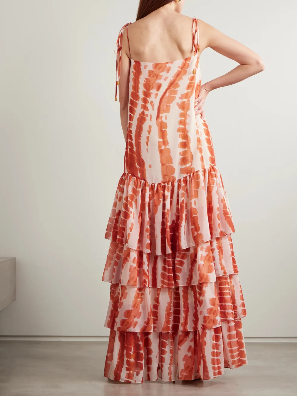 Back view of the Andres Otalora Tha Embellished Tiered Printed Recycled-chiffon Maxi Dress