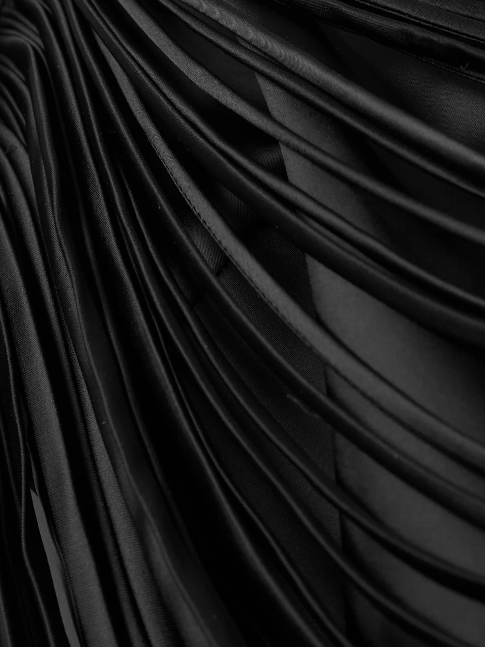 Close-up detail of the Andres Otalora Tierra De Oro Draped Cropped Satin Top