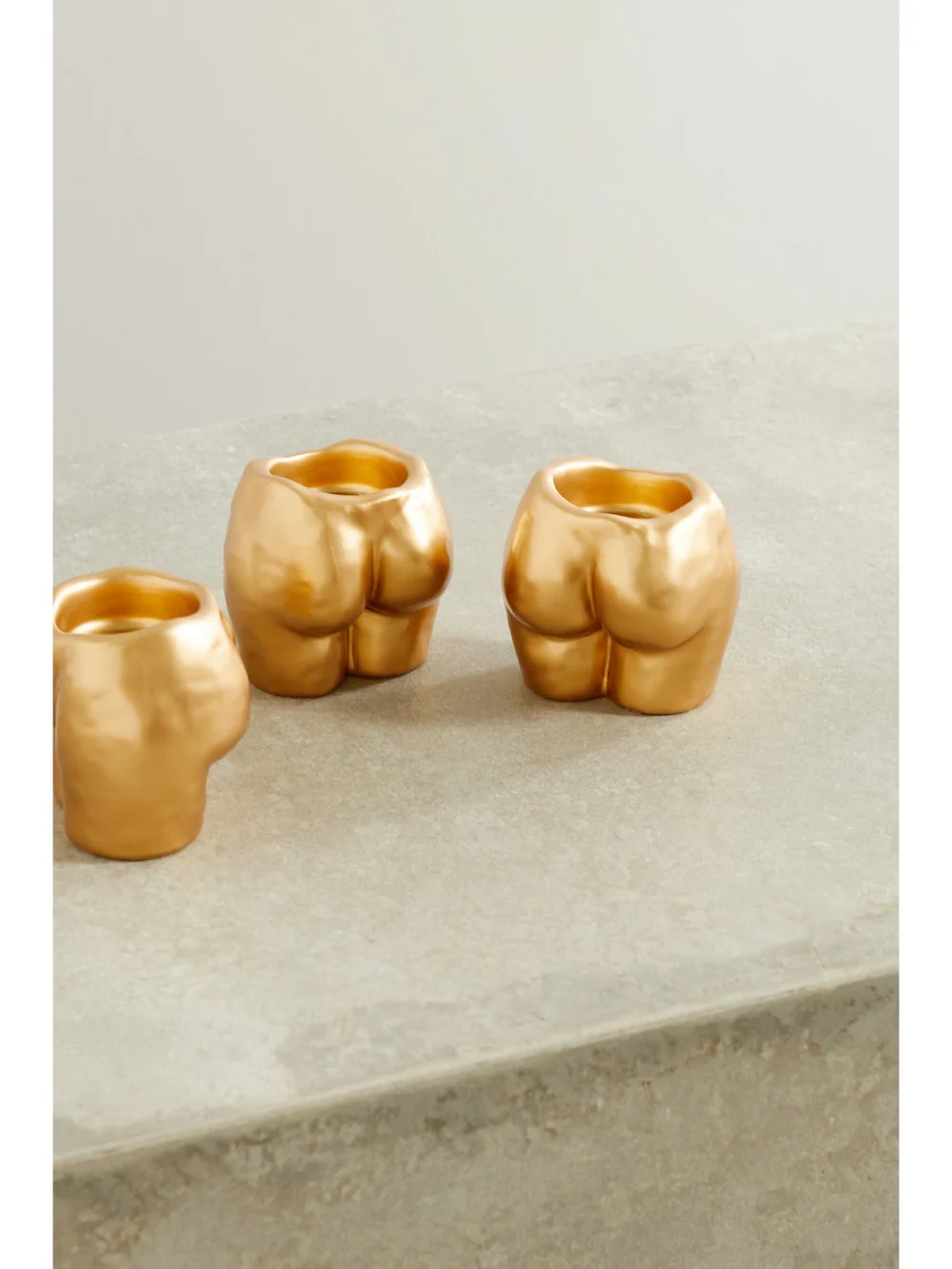 Back view of the Anissa Kermiche Rock Bottom Set of Three Ceramic Tea Light Holders
