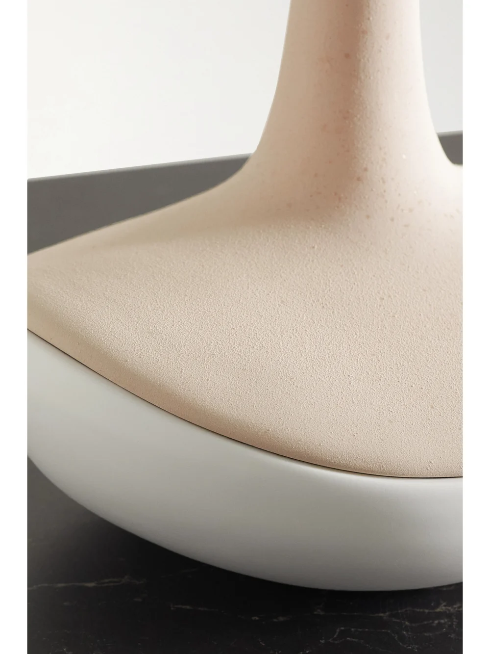 Close-up detail of the Anissa Kermiche Speckled Ceramic Jewelry Box Vase