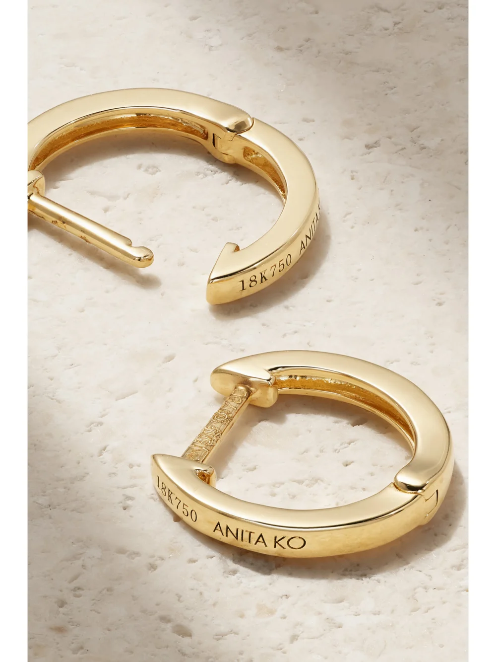 Close-up detail of the Anita Ko Huggies 18-karat Gold Hoop Earrings