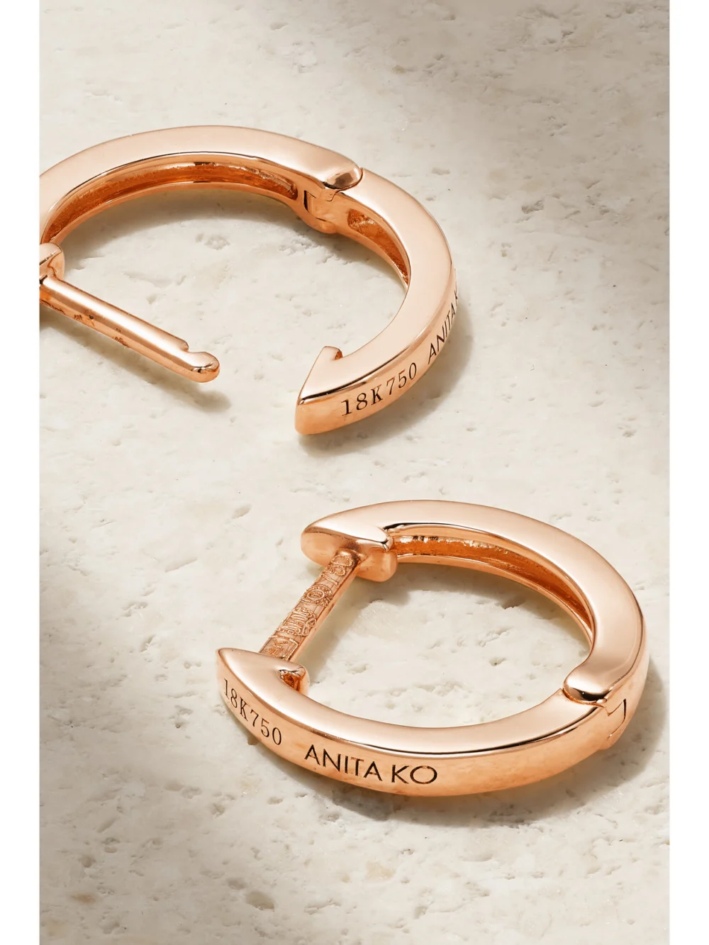Close-up detail of the Anita Ko Huggies 18-karat Rose Gold Hoop Earrings
