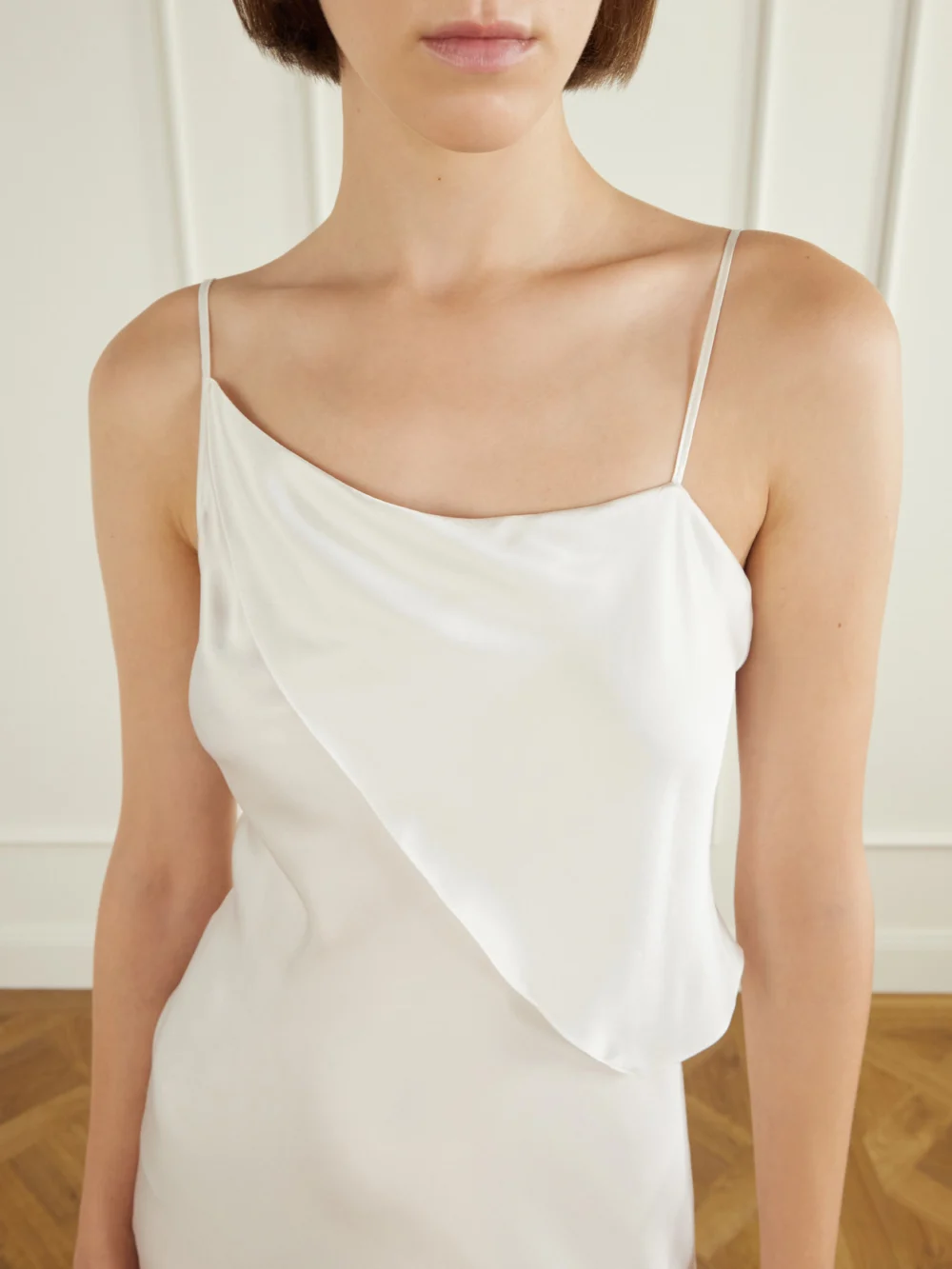 Close-up detail of the Ann Demeulemeester Aaricia Asymmetric Silk-satin Maxi Dress