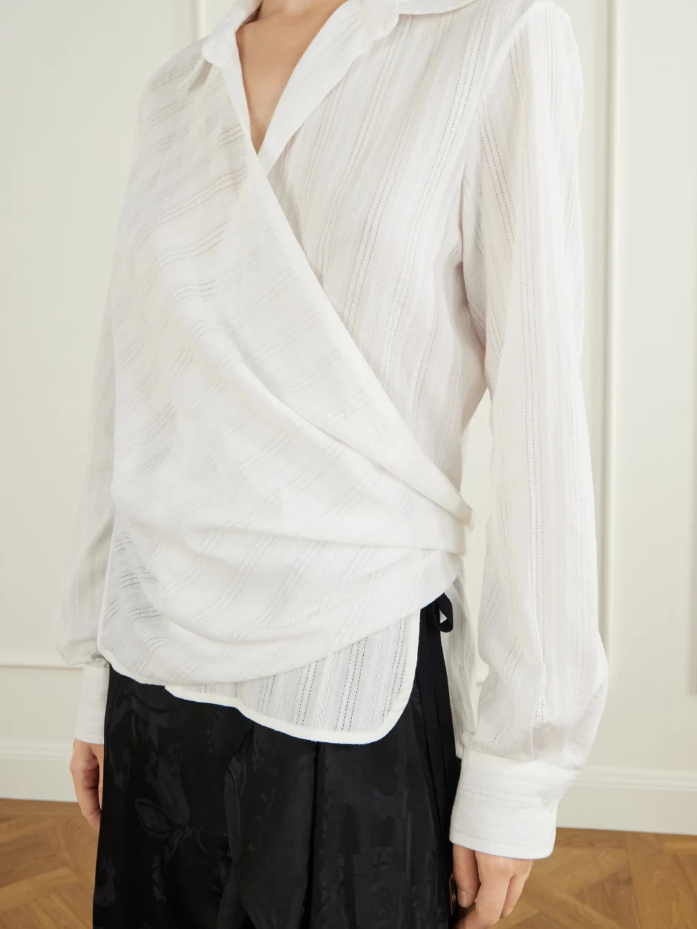 Close-up detail of the Ann Demeulemeester Alba Wrap Openwork-stripe Cotton Shirt