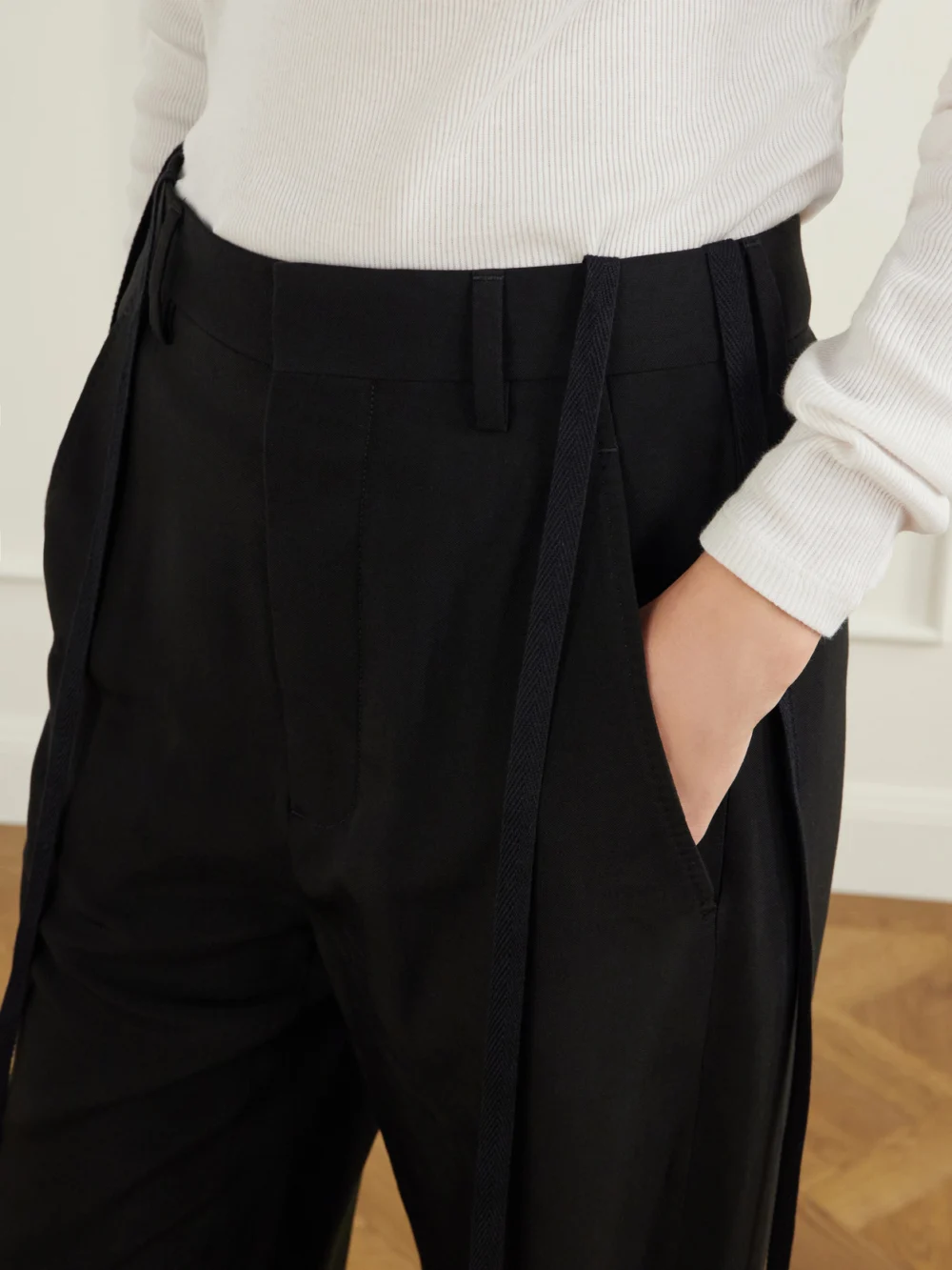 Close-up detail of the Ann Demeulemeester Anneke Ribbon-detailed Jersey Wide-leg Pants