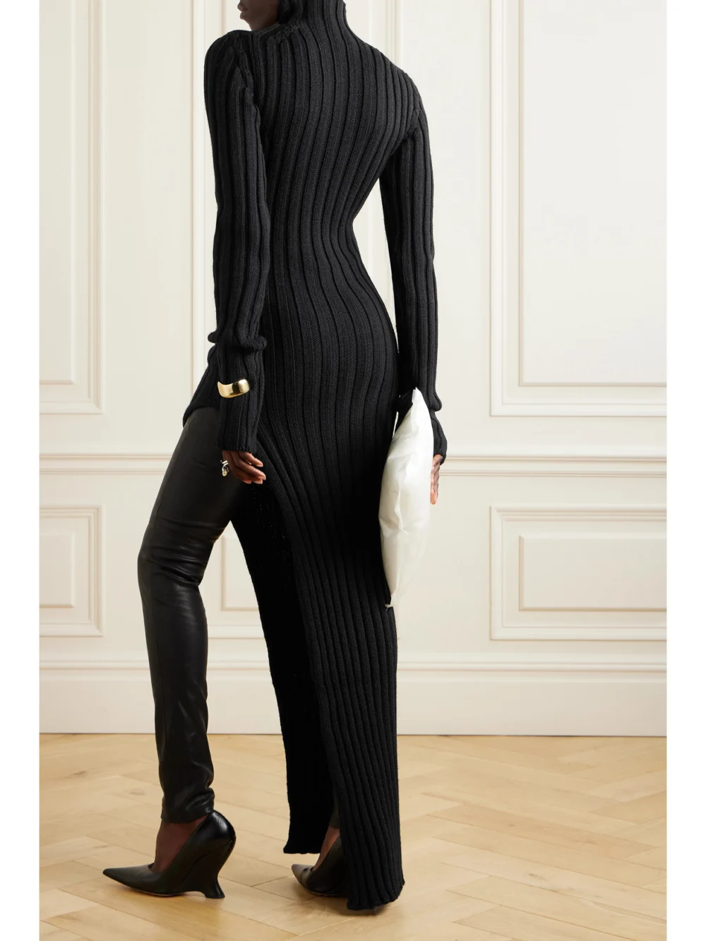Back view of the Ann Demeulemeester Cyntia Ribbed Wool Turtleneck Sweater