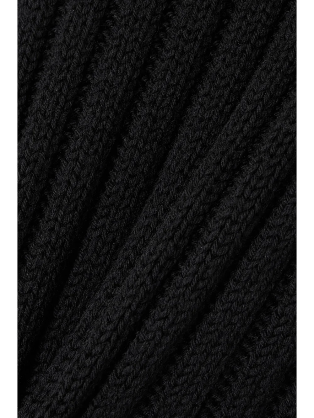 Close-up detail of the Ann Demeulemeester Cyntia Ribbed Wool Turtleneck Sweater