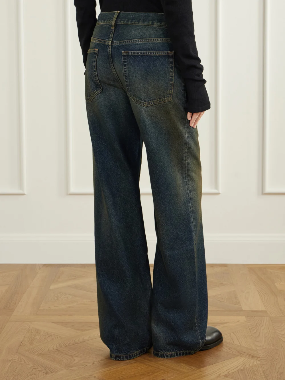 Back view of the Ann Demeulemeester Genoveva Mid-rise Wide-leg Jeans
