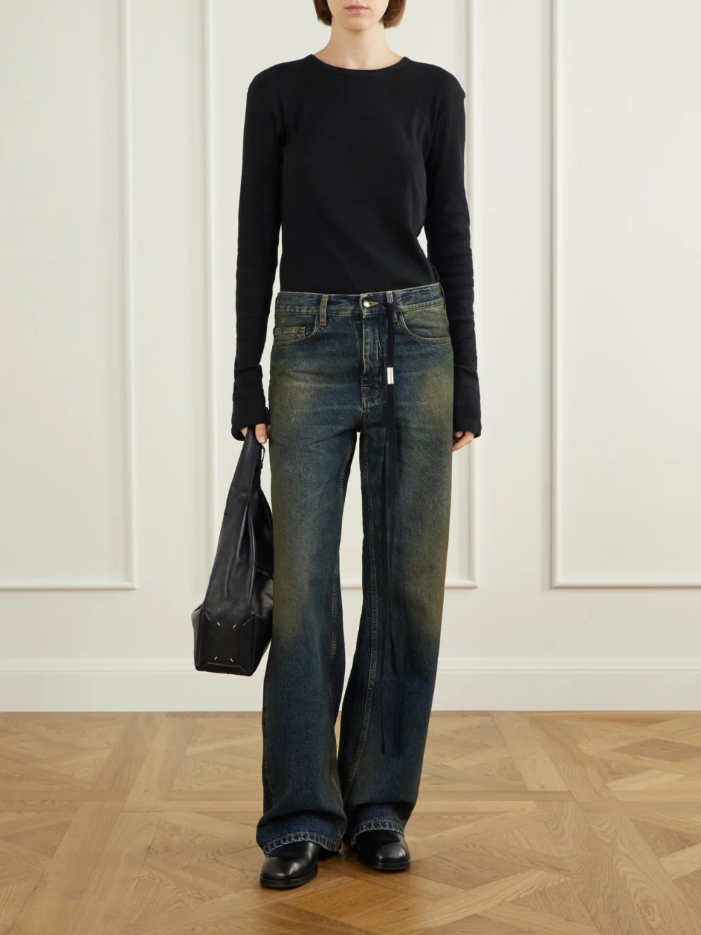 Ann Demeulemeester Genoveva Mid-rise Wide-leg Jeans, worn by a model