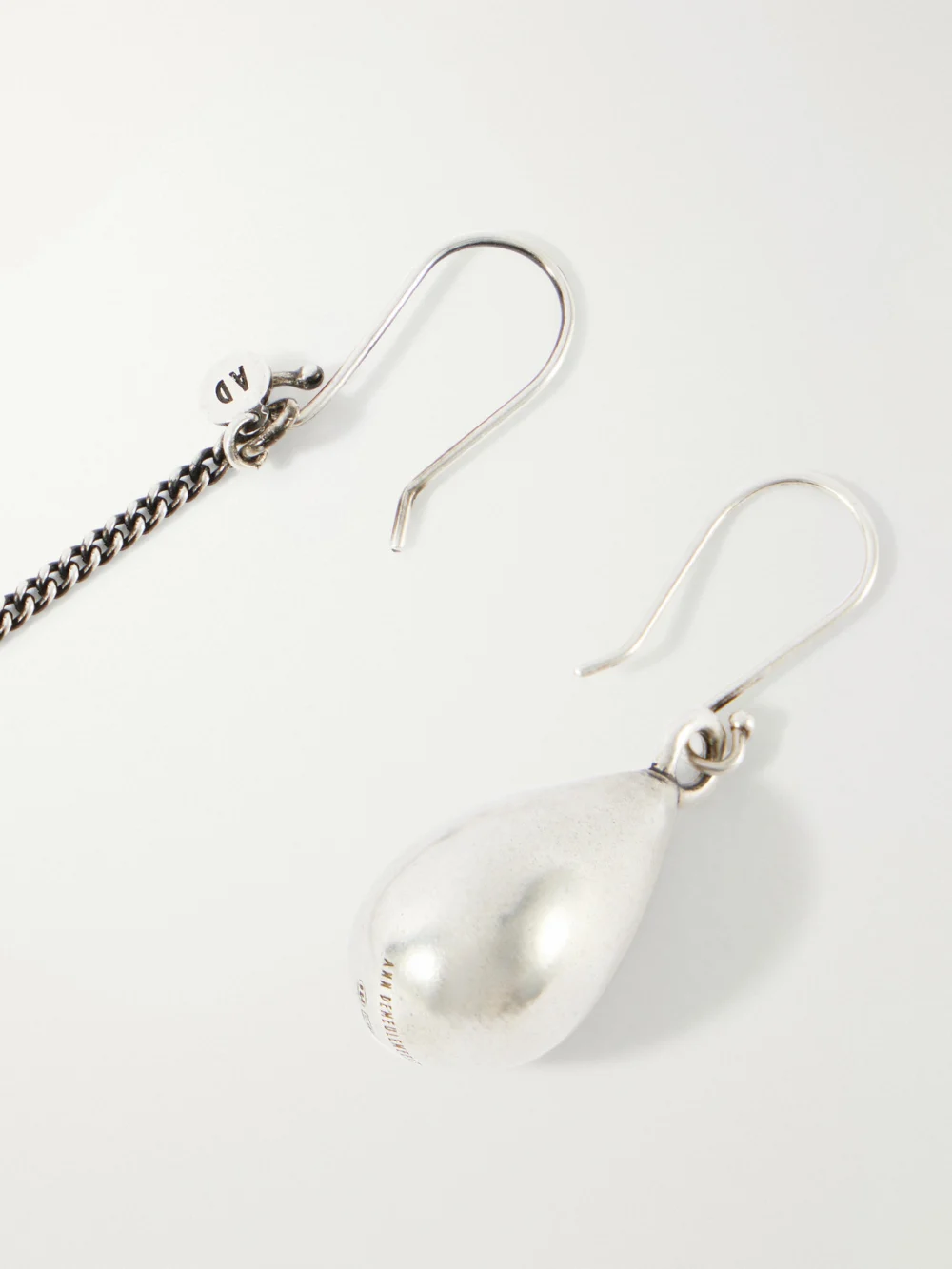 Close-up detail of the Ann Demeulemeester Judith Chain-embellished Silver Drop Earrings