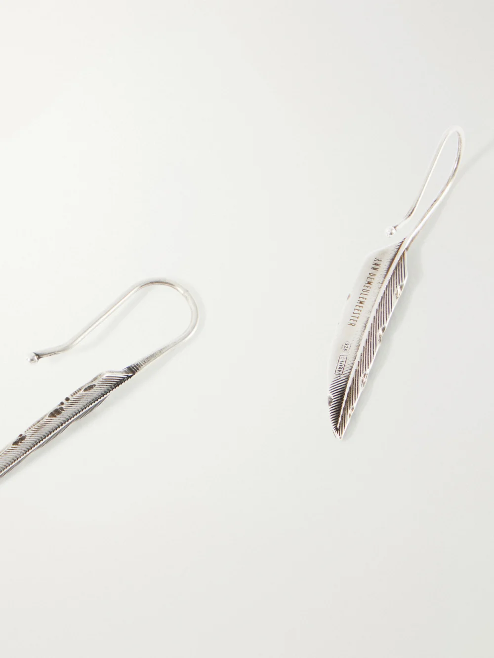 Close-up detail of the Ann Demeulemeester Mimmu Silver Earrings