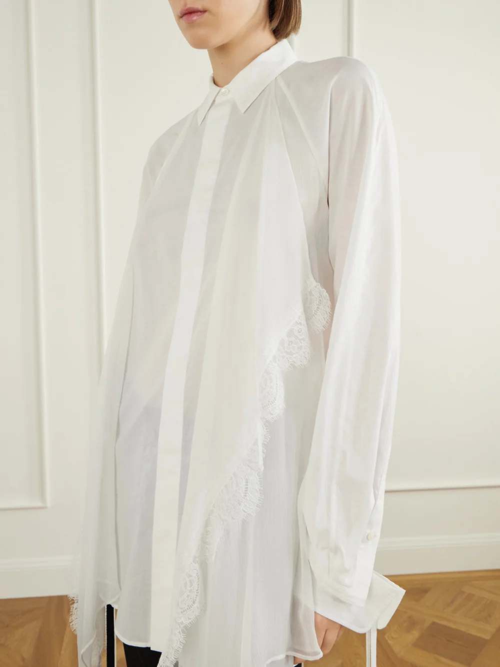 Close-up detail of the Ann Demeulemeester Sini Silk-trimmed Cotton Shirt