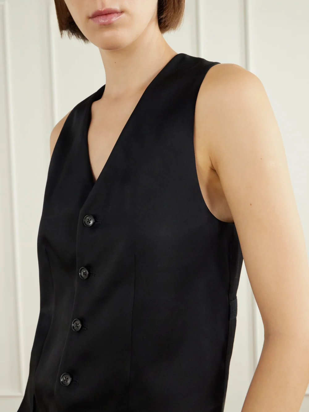 Close-up detail of the Ann Demeulemeester Stanse Belted Crepe Vest