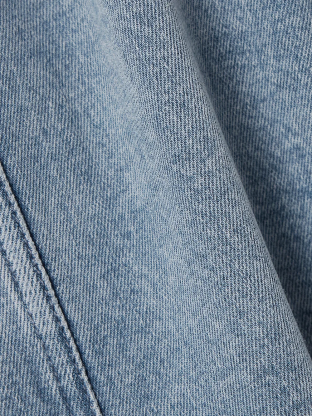 Close-up detail of the Another Tomorrow Organic Denim Midi Skirt