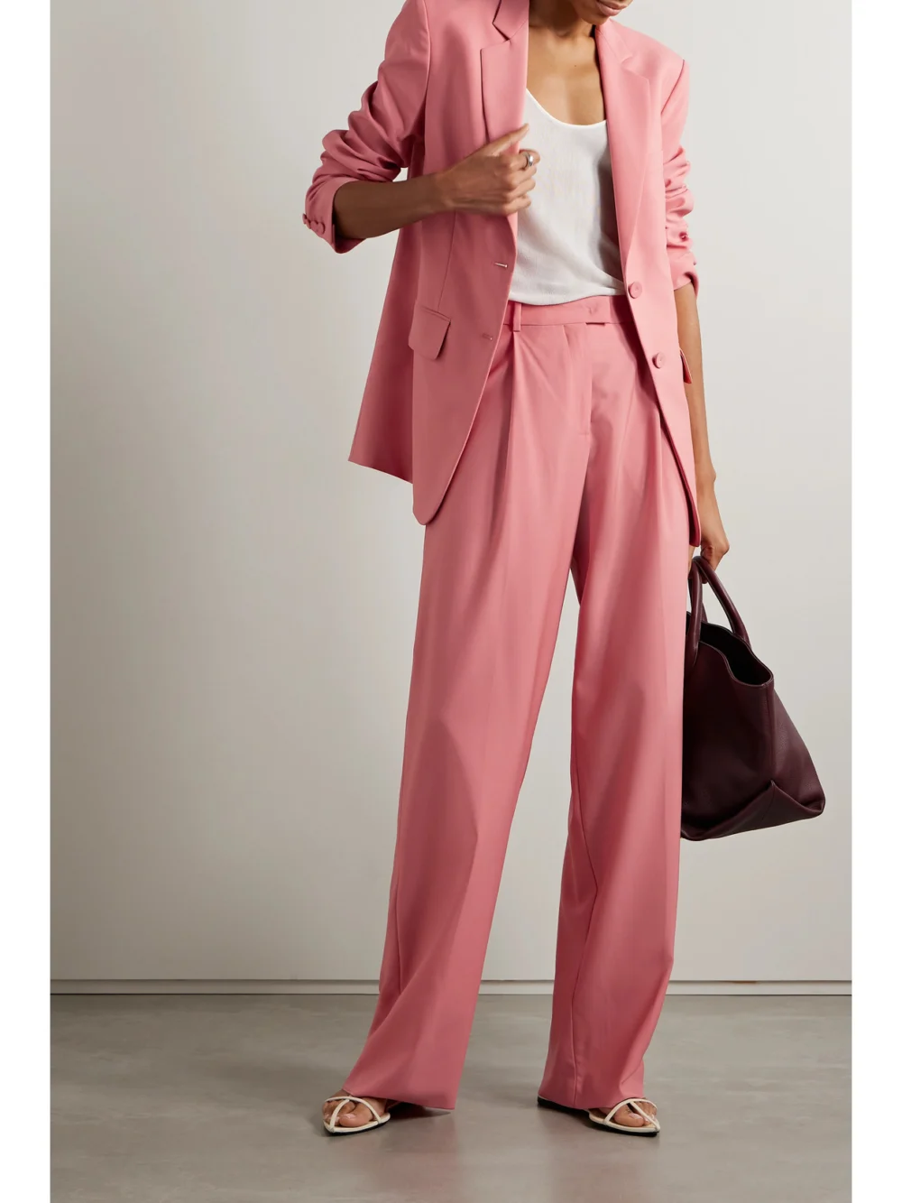 Another Tomorrow Pleated Wool Wide-leg Pants, worn by a model