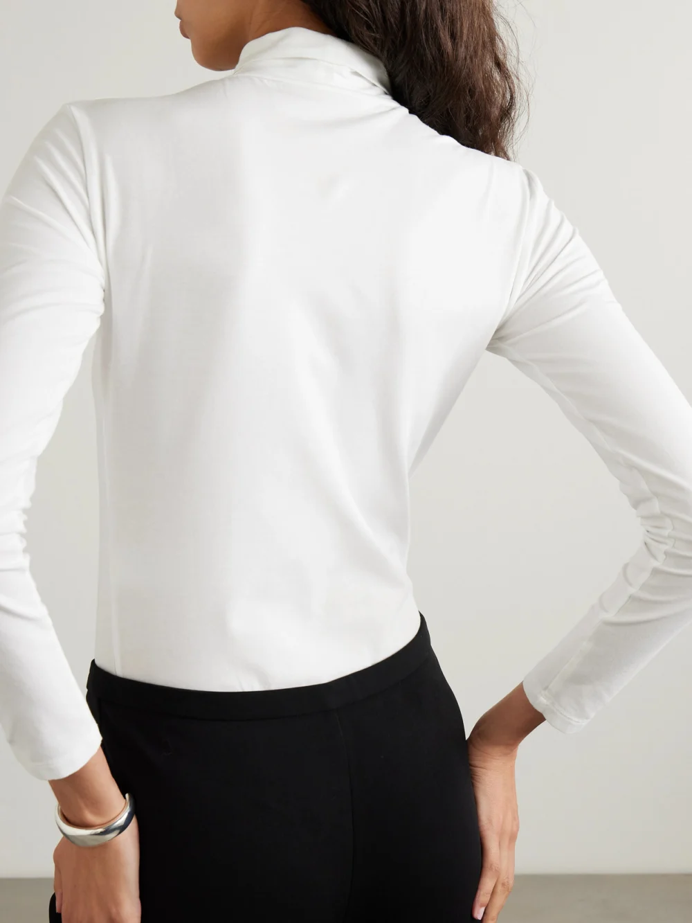 Back view of the Another Tomorrow Stretch-cotton and Lyocell-blend Jersey Turtleneck Bodysuit