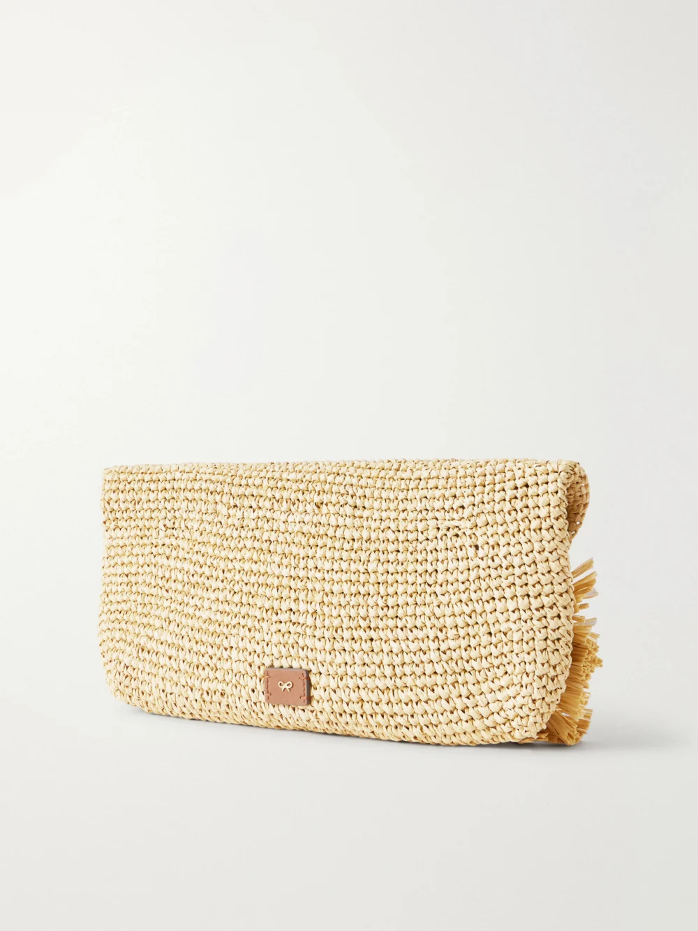 Back view of the Anya Hindmarch Bow Leather-trimmed Raffia Clutch