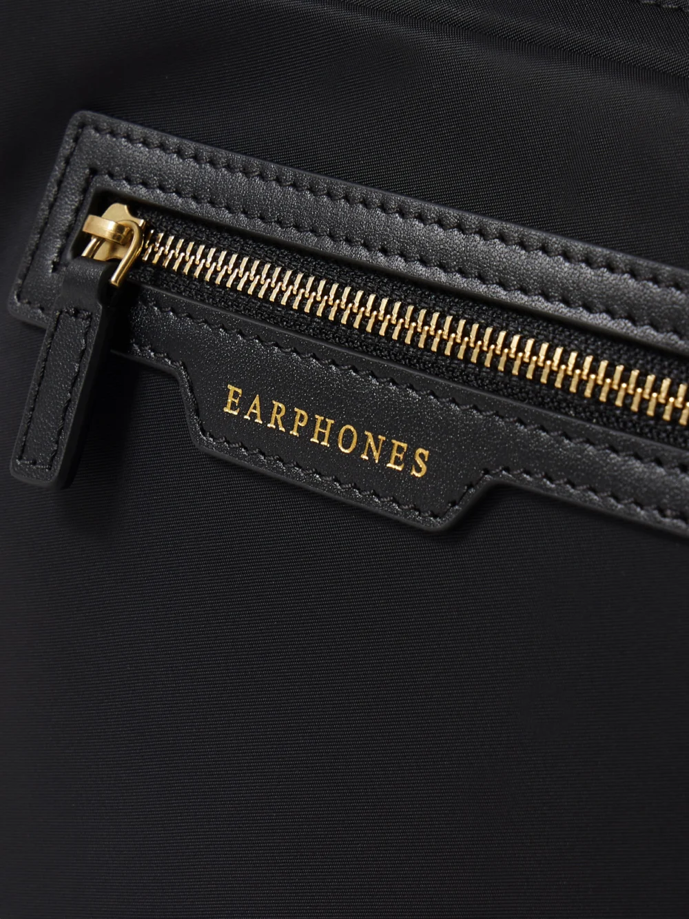 Close-up detail of the Anya Hindmarch Leather-trimmed Econyl® Shoulder Bag