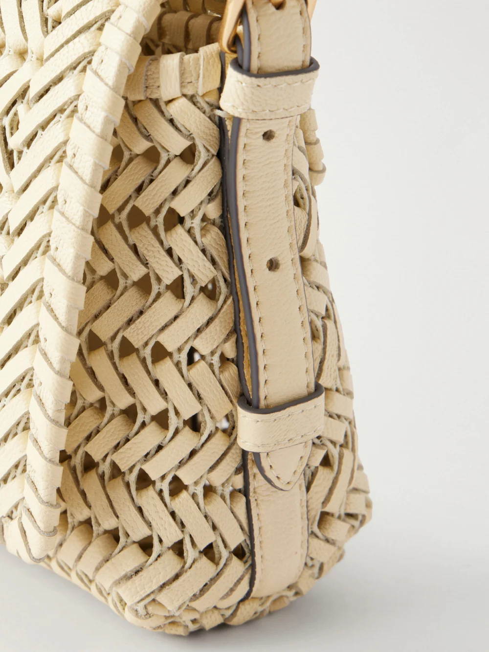 Close-up detail of the Anya Hindmarch The Nesson Woven Leather Shoulder Bag