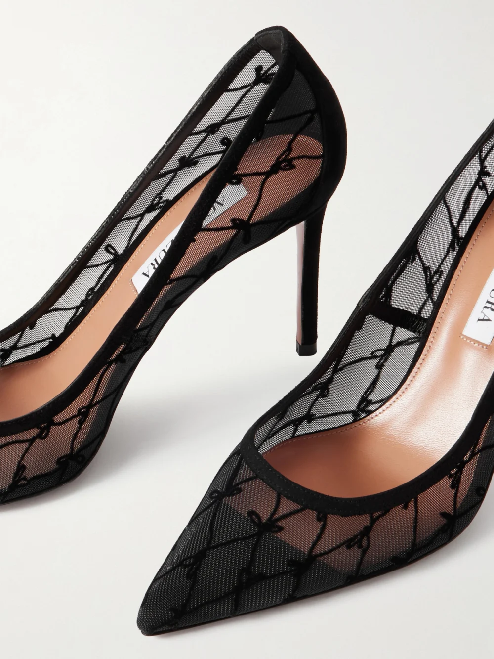 Close-up detail of the Aquazzura 85 Suede-trimmed Flocked Mesh Pumps