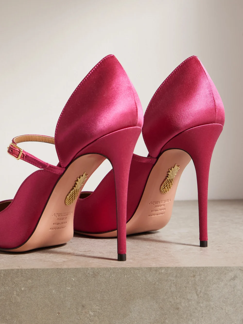 Back view of the Aquazzura Bellezza 105 Satin Mary Jane Pumps