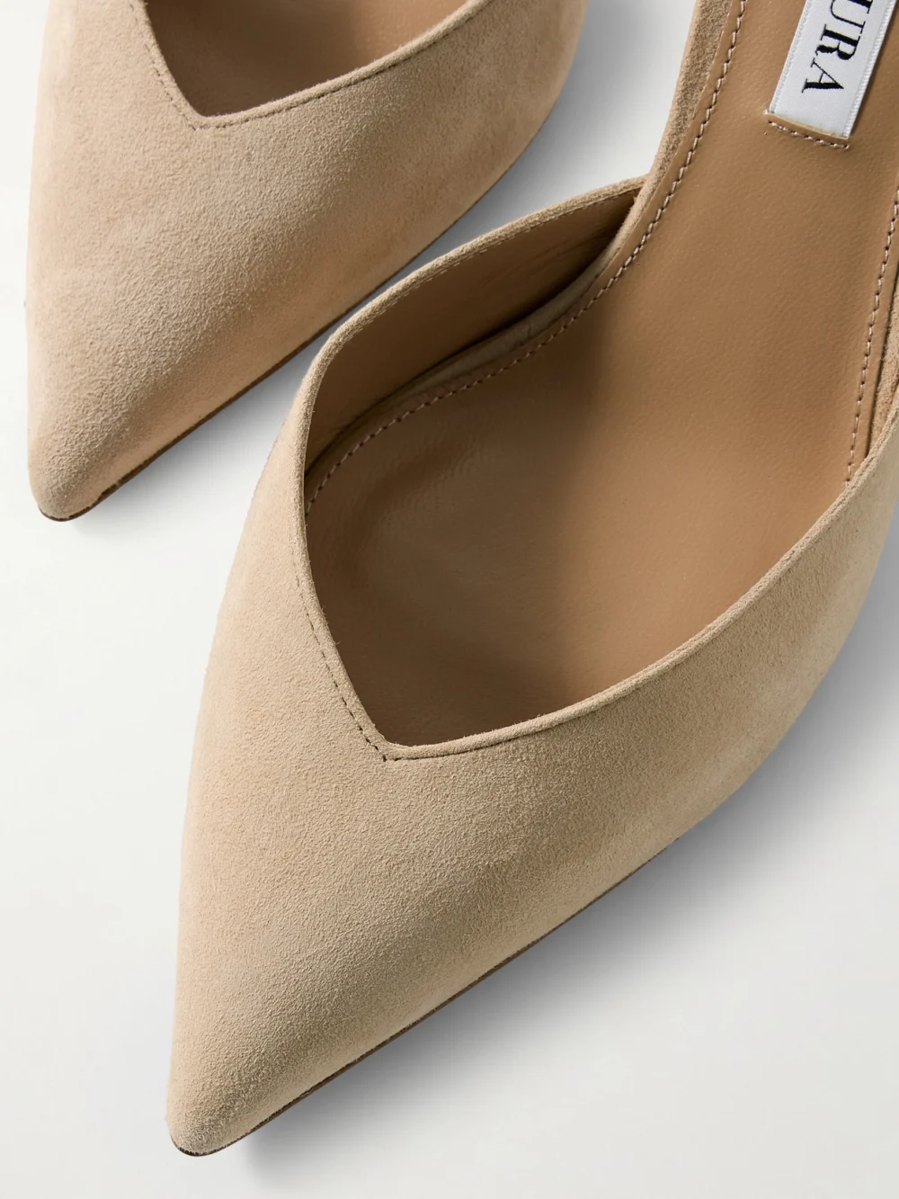 Close-up detail of the Aquazzura Beyond 65 Suede Pumps