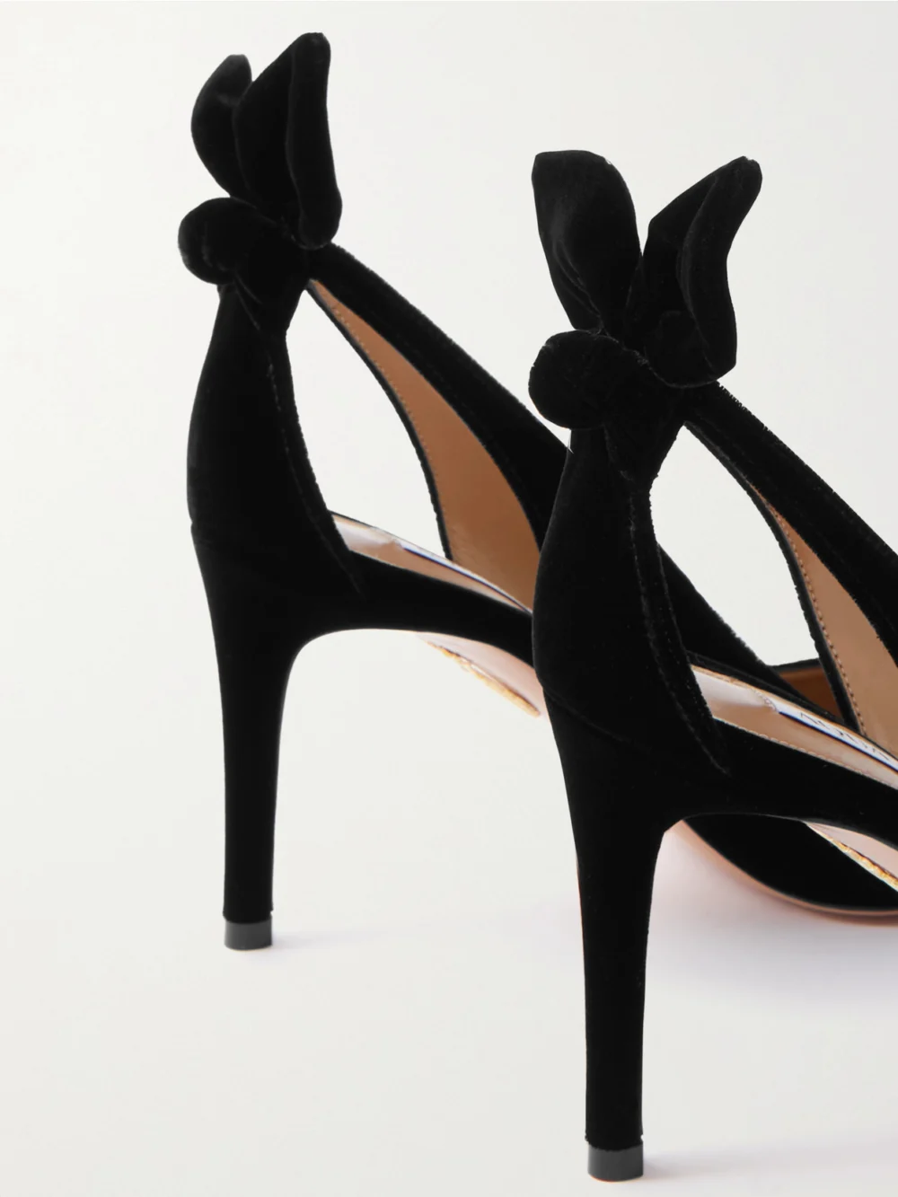 Close-up detail of the Aquazzura Bow Tie 85 Velvet Pumps