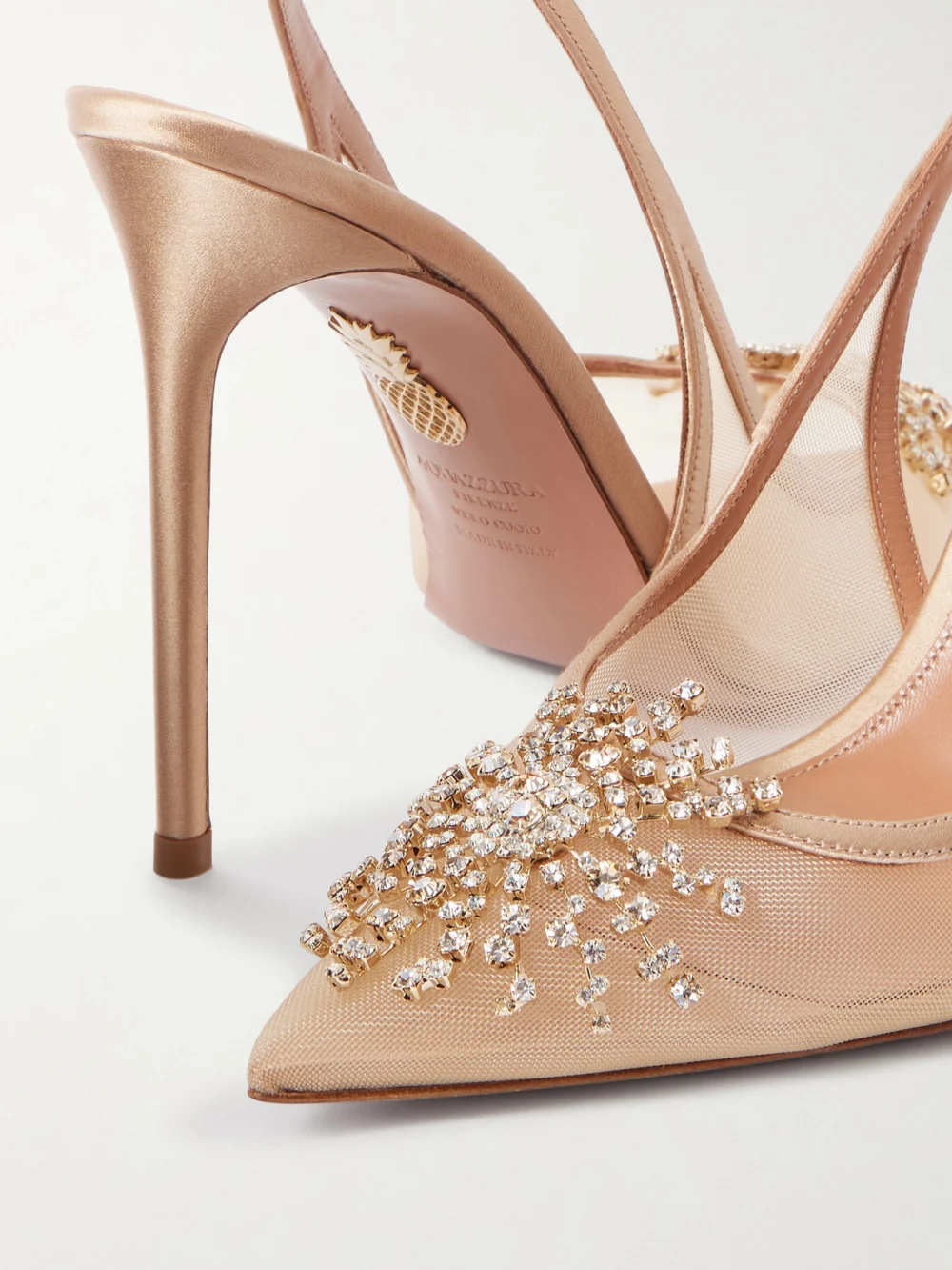 Close-up detail of the Aquazzura Firework 105 Crystal-embellished Satin-trimmed Mesh Pumps