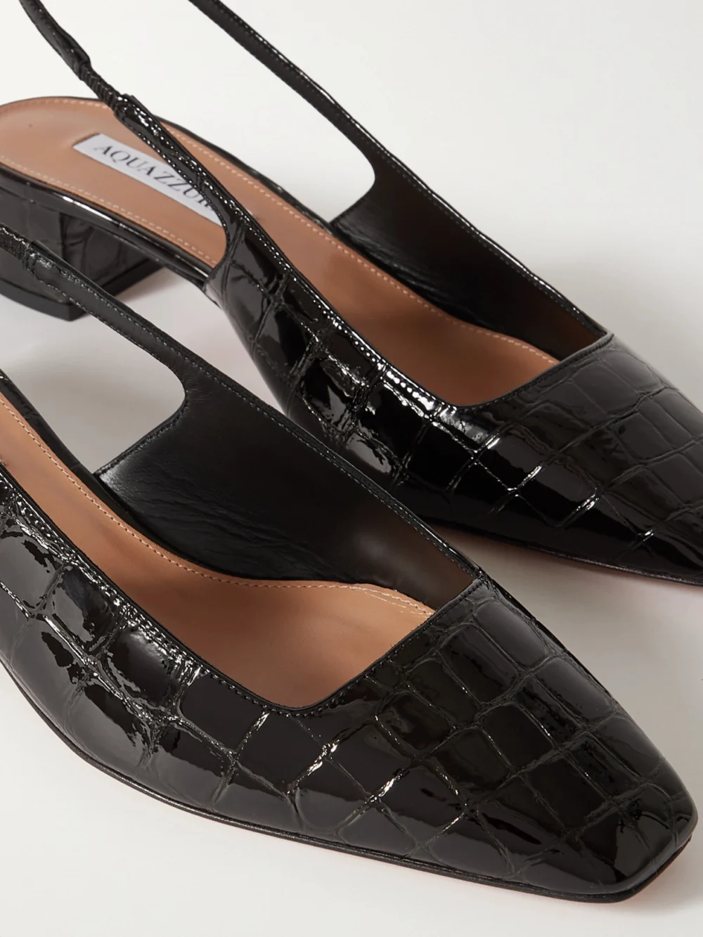 Close-up detail of the Aquazzura Ginza 35 Croc-effect Patent-leather Slingback Pumps