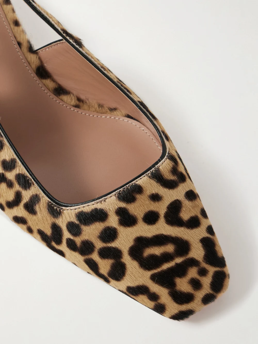 Close-up detail of the Aquazzura Ginza 35 Leopard-print Calf Hair Slingback Pumps