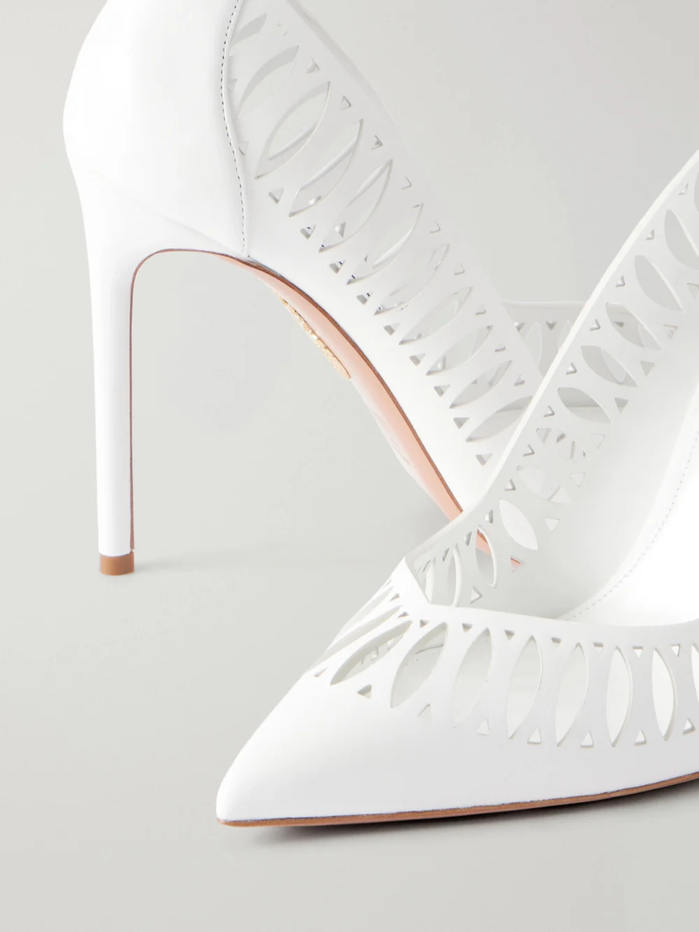 Close-up detail of the Aquazzura Gisele 105 Laser-cut Leather Pumps