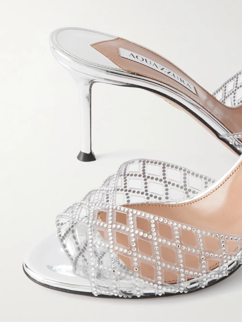Close-up detail of the Aquazzura Lumiere Crystal-embellished Cutout Pvc Mules