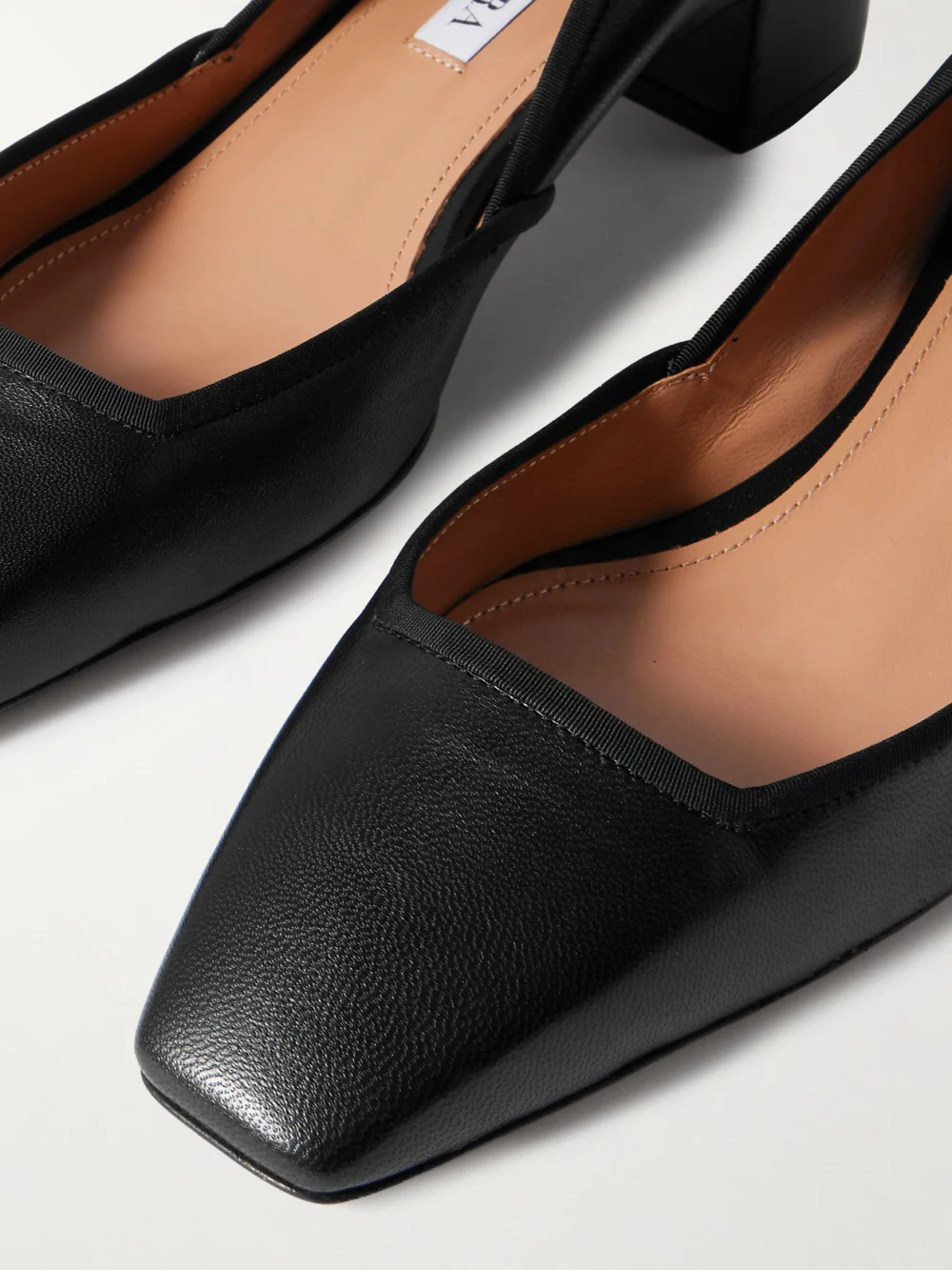 Close-up detail of the Aquazzura Maia 35 Grosgrain-trimmed Leather Pumps