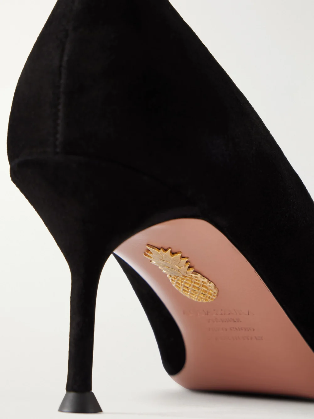 Close-up detail of the Aquazzura Orbit Pump 65 Patent Leather-trimmed Suede Pumps