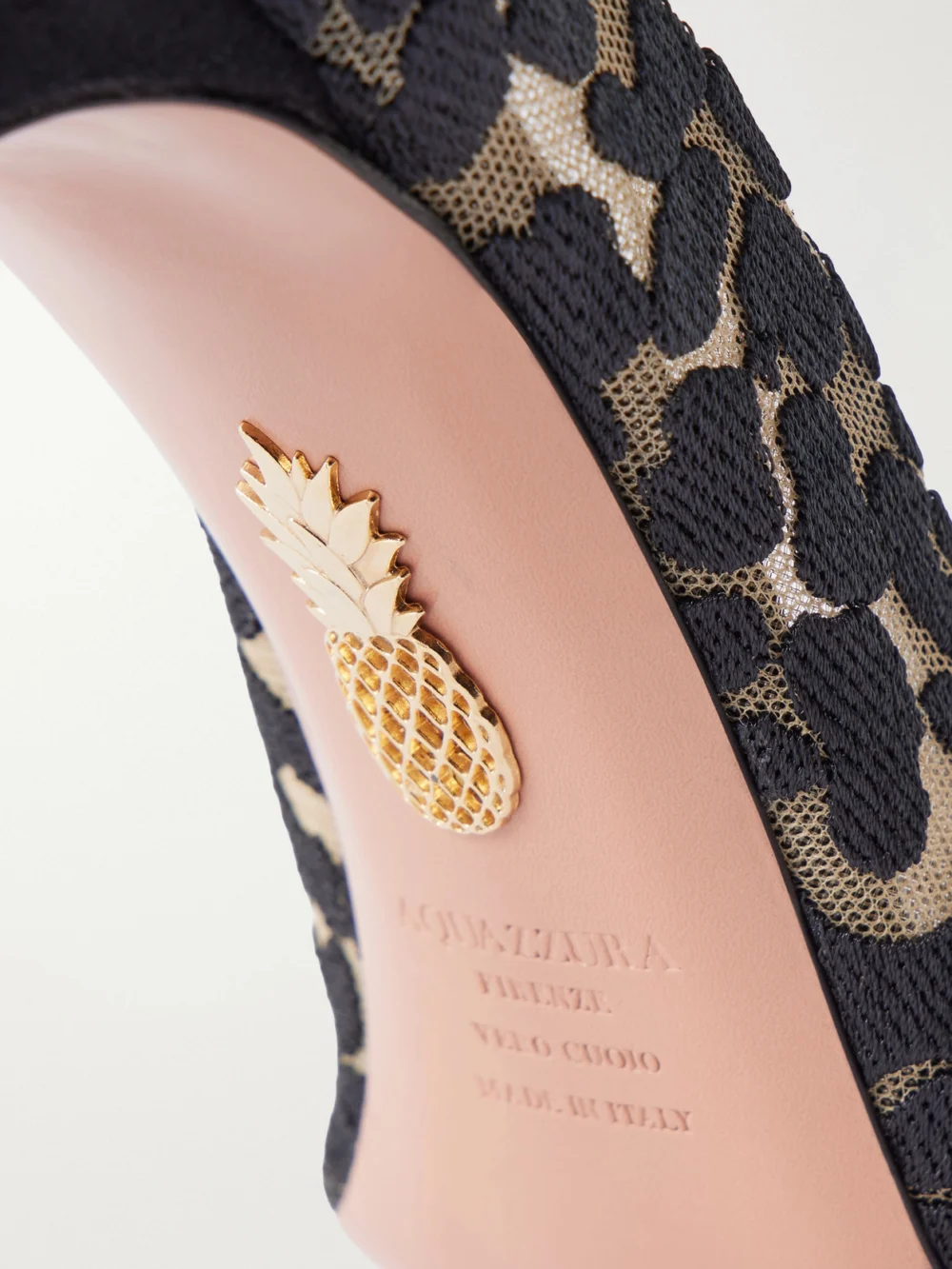 Close-up detail of the Aquazzura Panthera 105 Leopard-print Leather Pumps