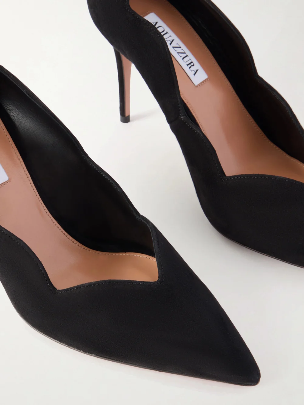 Close-up detail of the Aquazzura Petal 85 Scalloped Suede Pumps