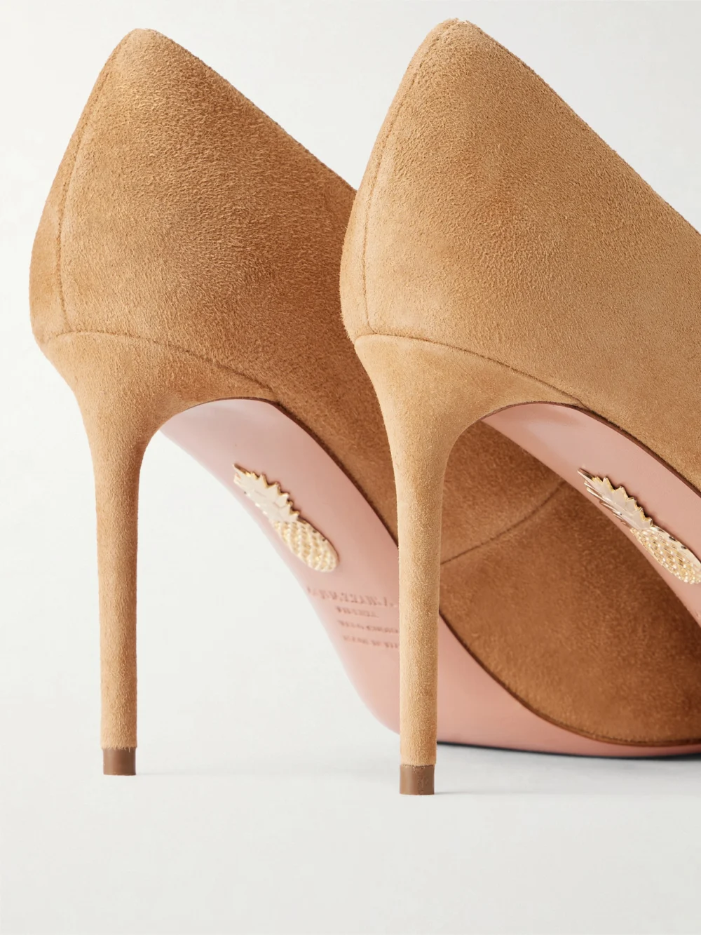 Close-up detail of the Aquazzura Purist 85 Suede Pumps