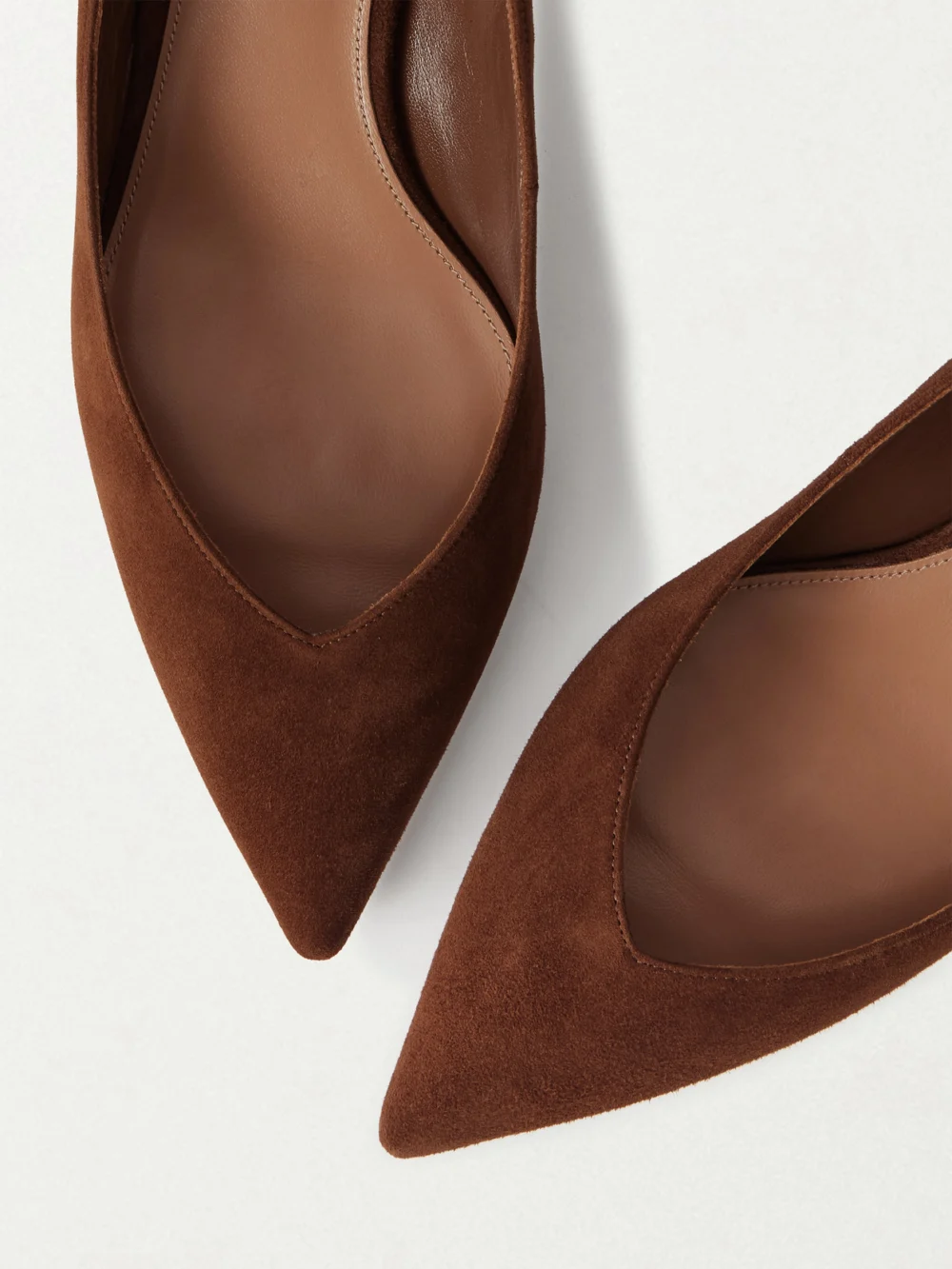 Close-up detail of the Aquazzura Sheeva 30 Cut-out Suede Pumps