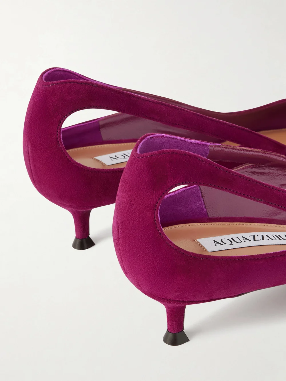 Close-up detail of the Aquazzura Sheeva 30 Cut-out Suede Pumps