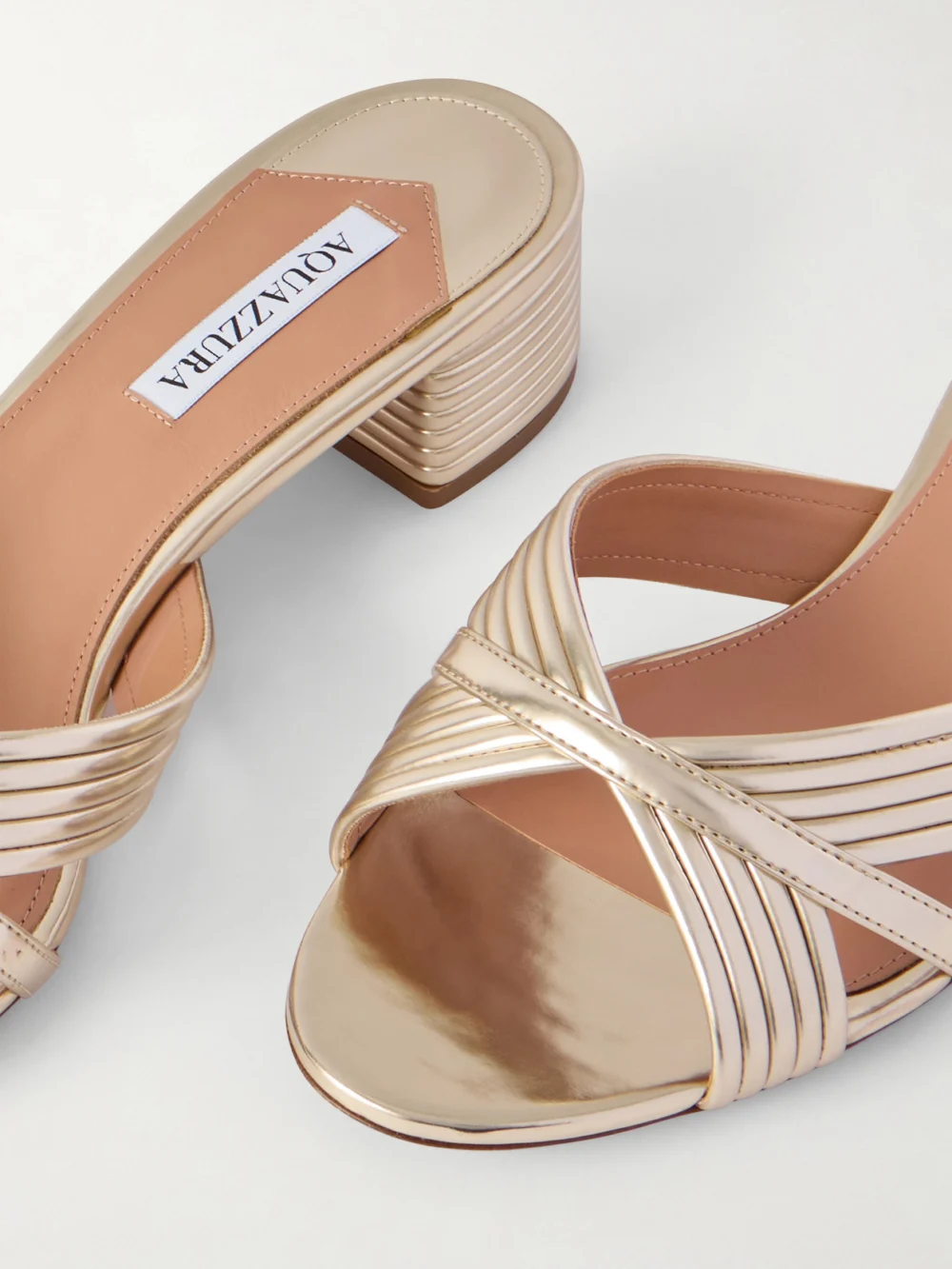 Close-up detail of the Aquazzura Sundance 35 Metallic Leather Mules