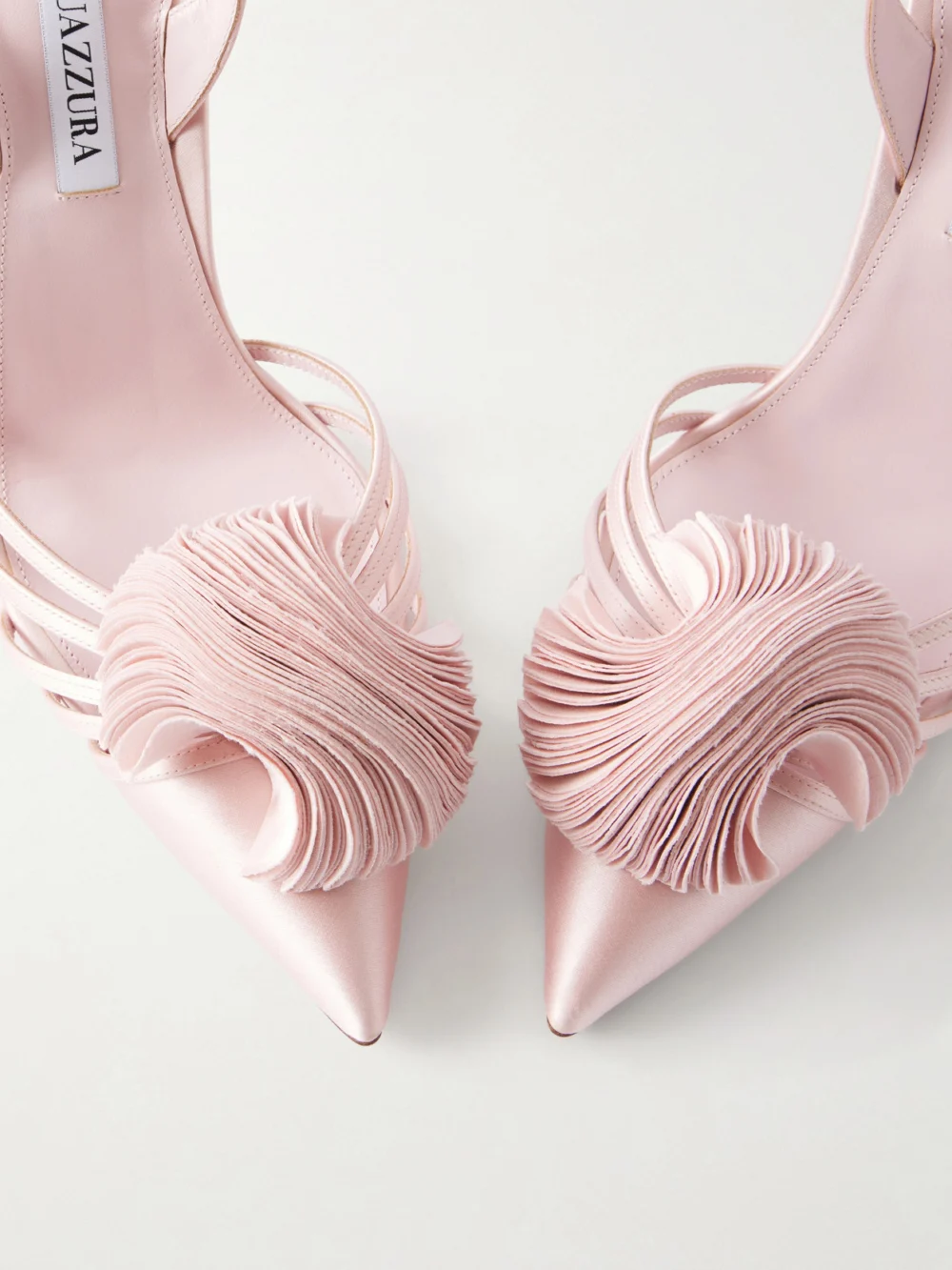 Close-up detail of the Aquazzura Wild Bloom 105 Appliquéd Satin Pumps