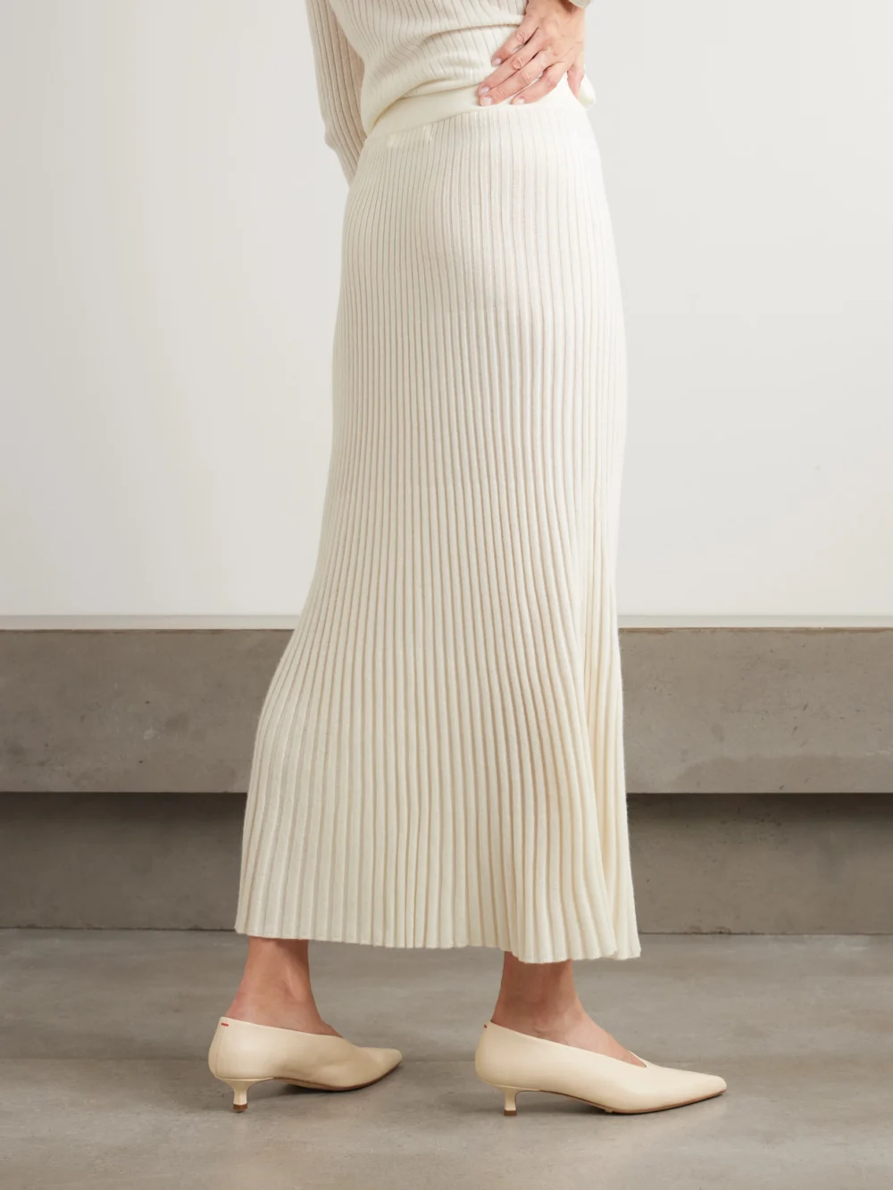 Back view of the Arch4 Nillie Ribbed Organic Cashmere Midi Skirt