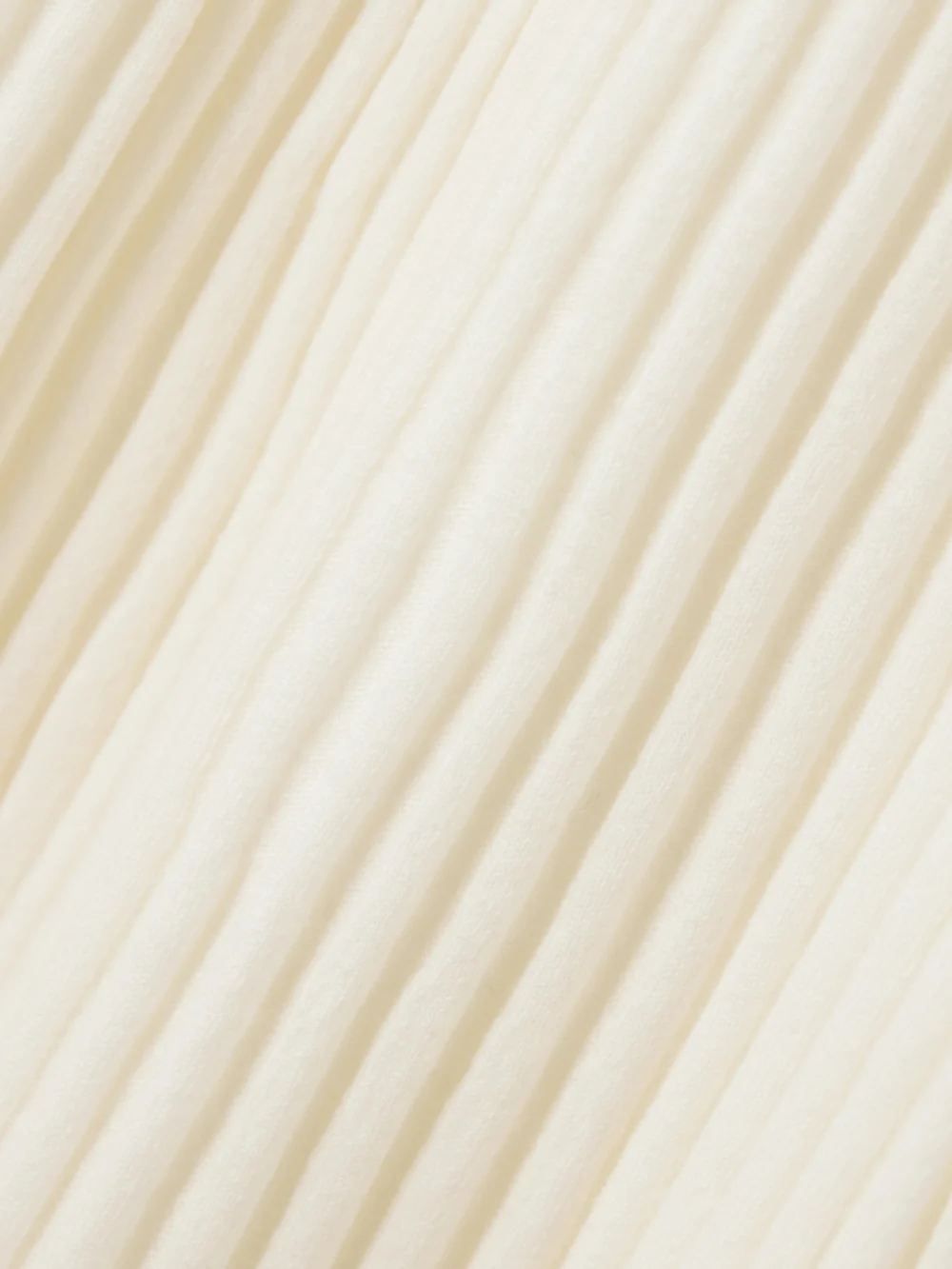 Close-up detail of the Arch4 Nillie Ribbed Organic Cashmere Midi Skirt